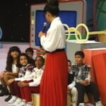 Mara como Professora Maroca